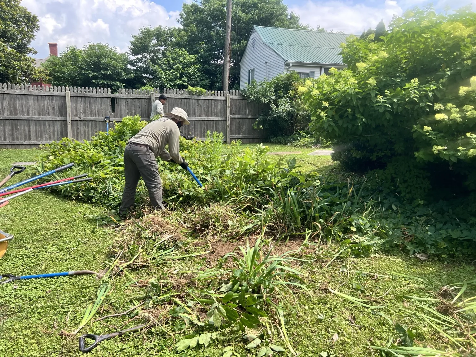Terrain Scapes crew working through a landscape cleanup
