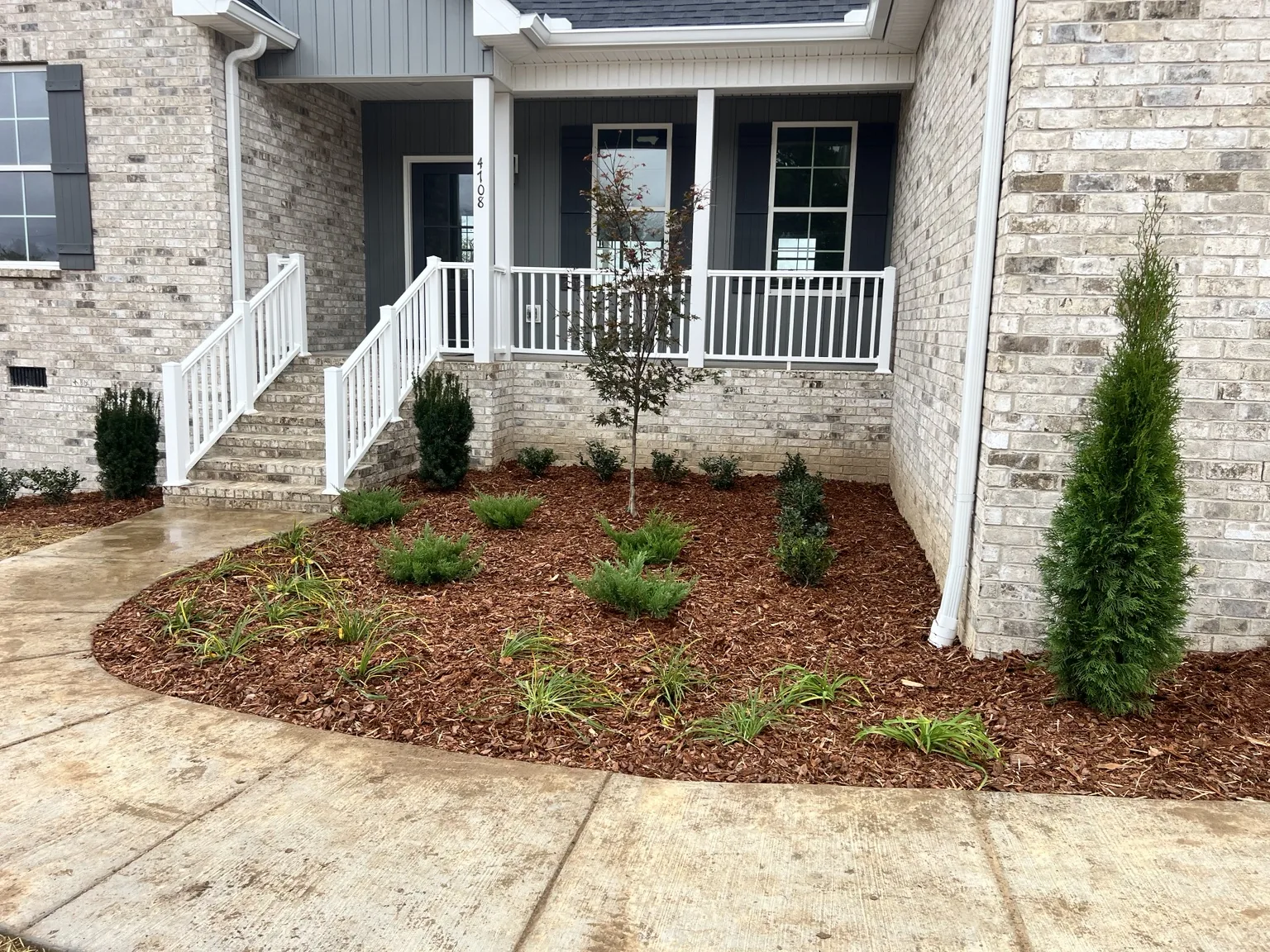 Finished foundation landscaping by Terrain Scapes